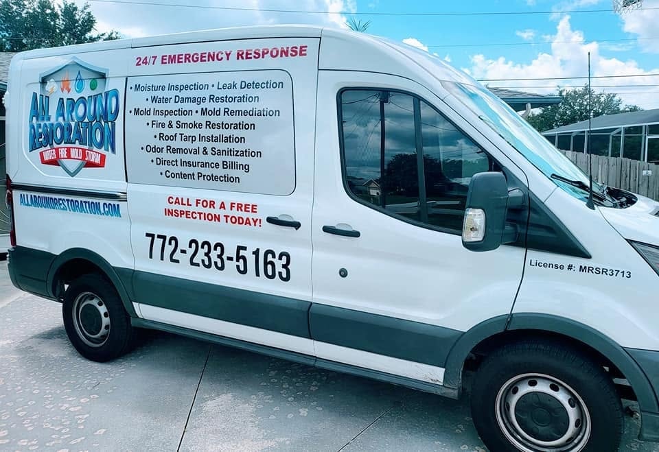 Industrial air movers drying office after water damage
